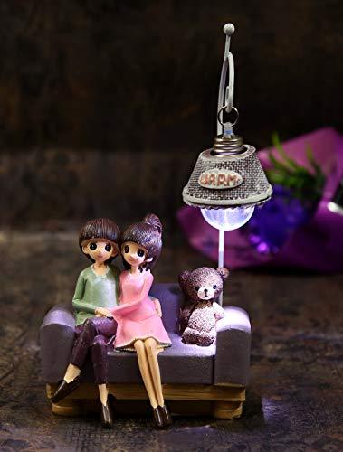 Webelkart Resin Cute Romantic Valentine Love Couple Sitting On Sofa Statue Showpiece, 20 CM, Multicolour, 1 Piece