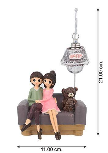 Webelkart Resin Cute Romantic Valentine Love Couple Sitting On Sofa Statue Showpiece, 20 CM, Multicolour, 1 Piece