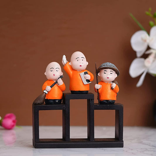 Webelkart Premium Set of 3 Child Monk Showpiece for Home and Office Decor| Child Monk Showpiece for Gift| Showpiece for Car Dashboard (Polyresin,Orange)