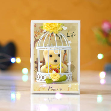 Webelkart®️ Premium Cute Little Teddy Sitting in Plastic Cage Showpiece for Her / Girlfriend / Wife / Fiancee / Valentines Day ( Yellow)