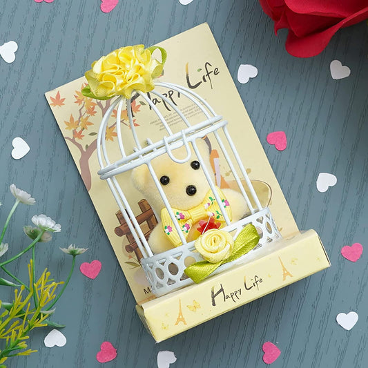 Webelkart®️ Premium Cute Little Teddy Sitting in Plastic Cage Showpiece for Her / Girlfriend / Wife / Fiancee / Valentines Day ( Yellow)