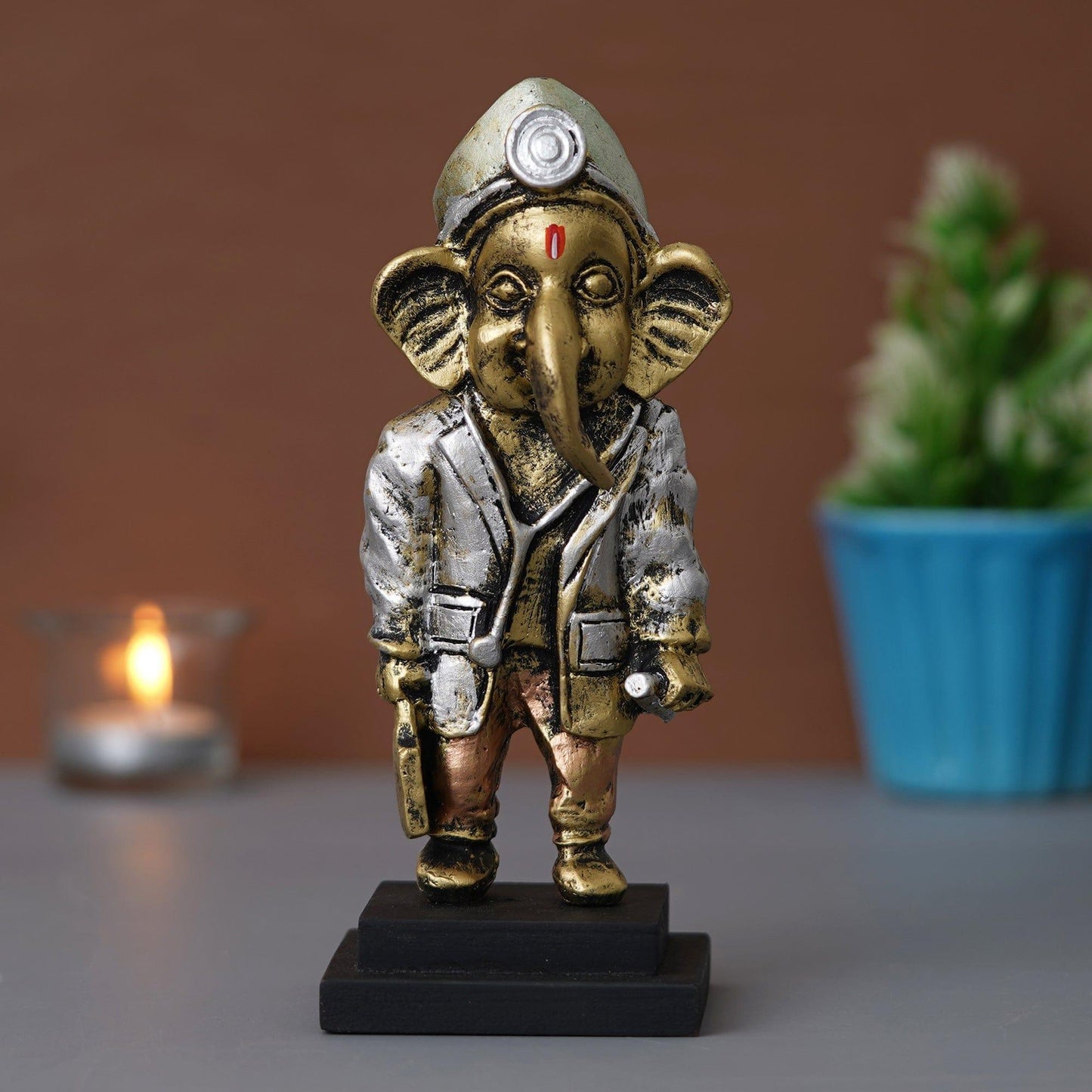 Webelkart®️ Premium Resin Dr. Ganesha Idol Statue for Home and Office Decorations, Ganesha Idol for Table and Car Dashboard Decor ( 7.5 Inches, Multi) |Ganesha with Doctor Kit and Dress up